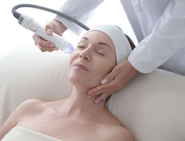 woman undergoing a microneedling treatment